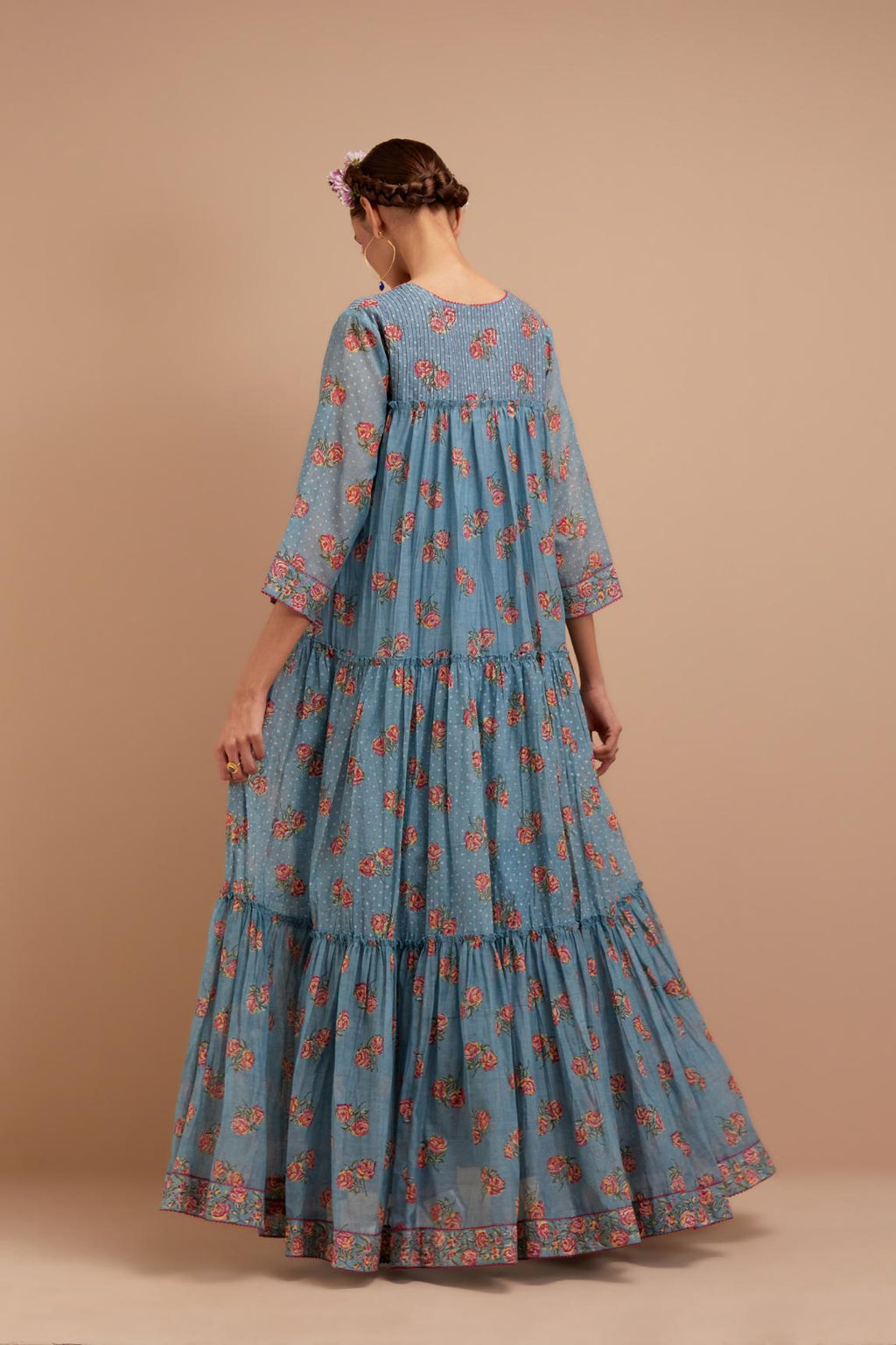 Cadet Blue three-tiered kurta set with quilted yoke and all-over Pink & Yellow floral hand block print.