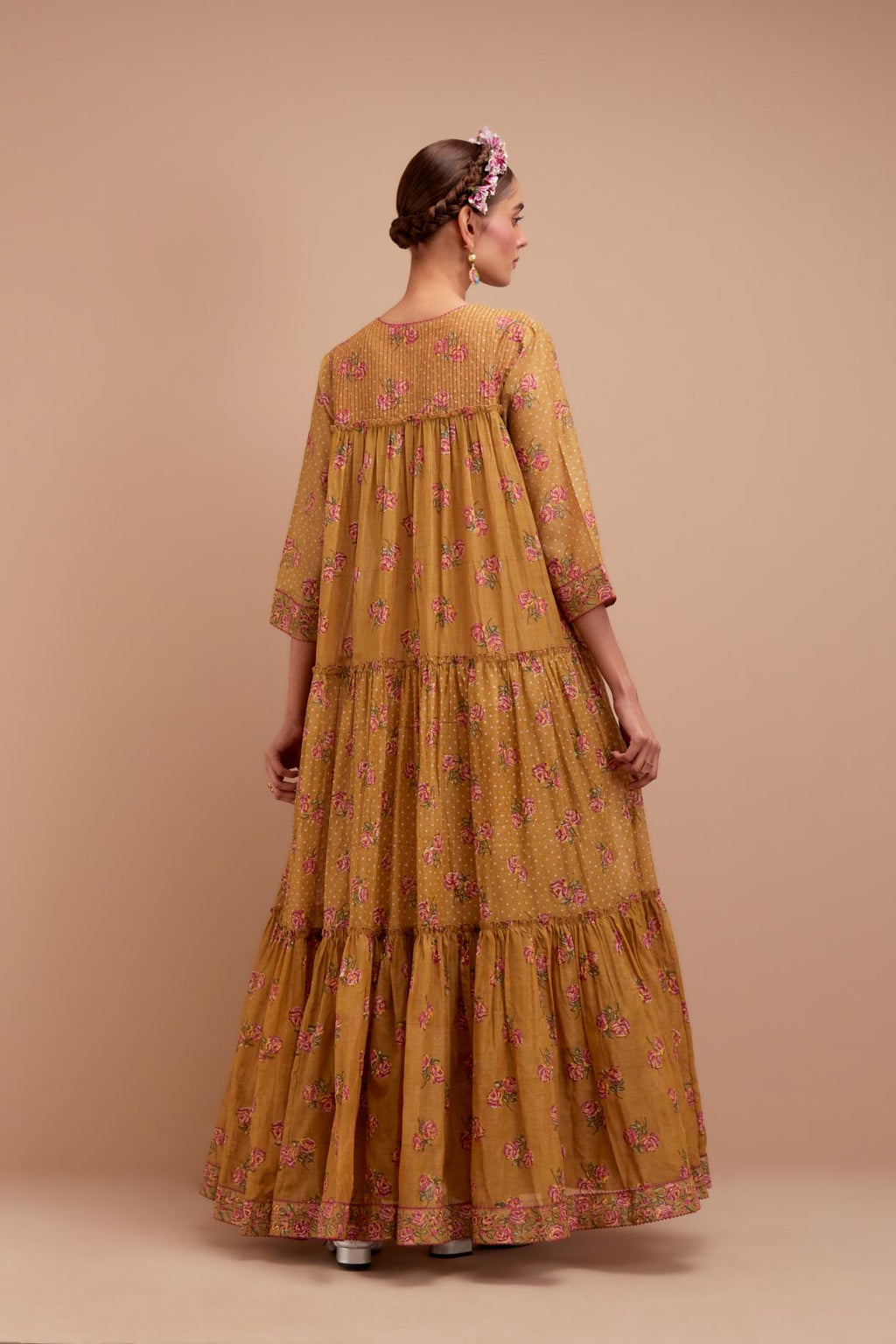 Olive Yellow three-tiered kurta set with quilted yoke and all-over Pink & Yellow floral hand block print.