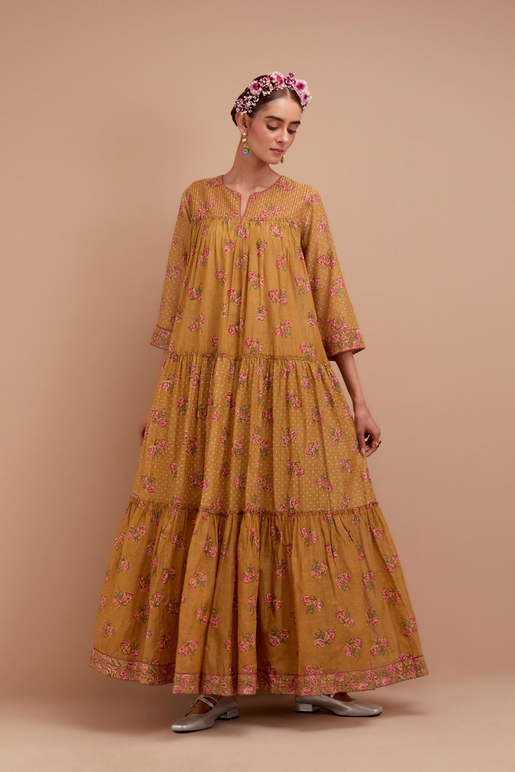 Olive Yellow three-tiered kurta set with quilted yoke and all-over Pink & Yellow floral hand block print.