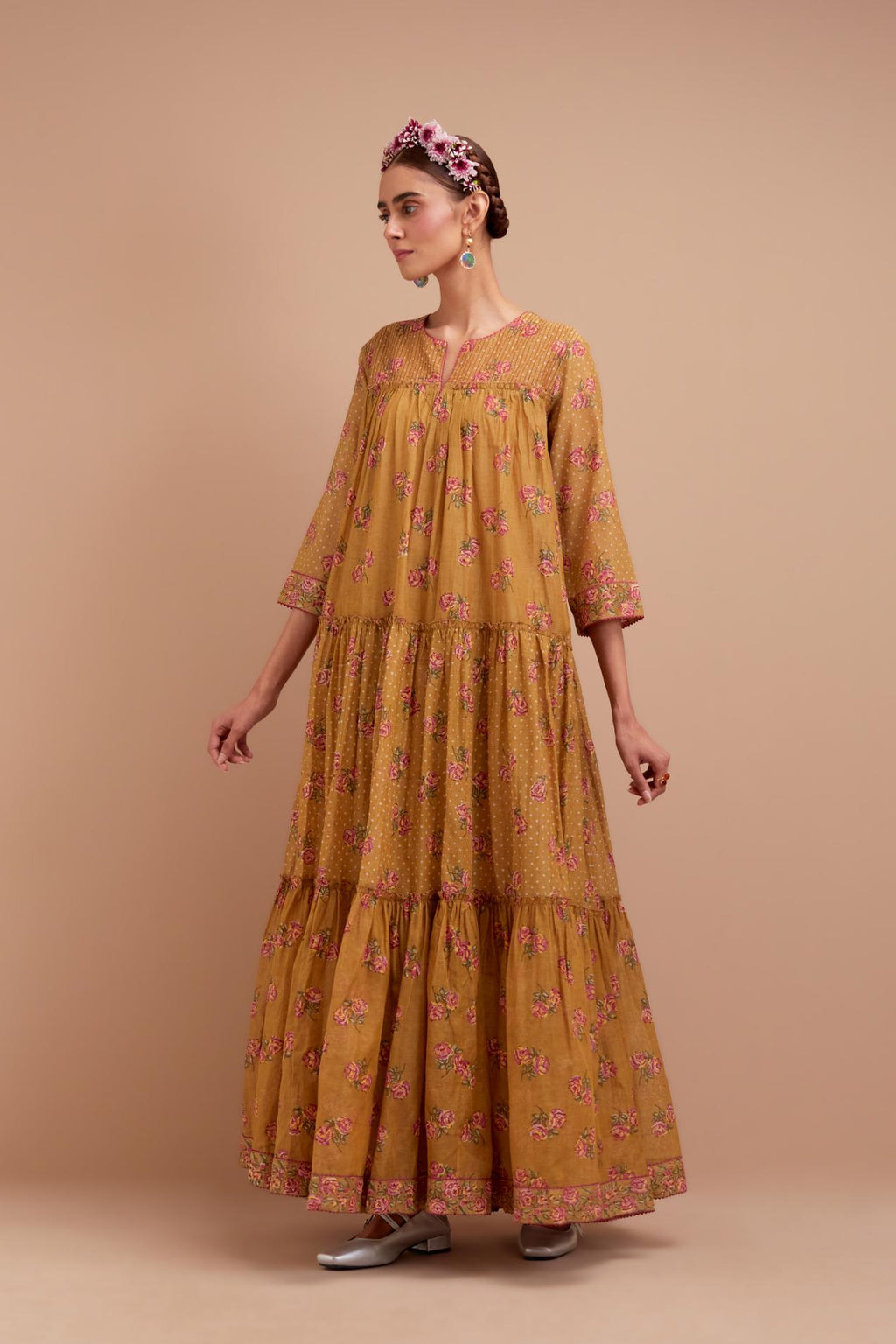Olive Yellow three-tiered kurta set with quilted yoke and all-over Pink & Yellow floral hand block print.
