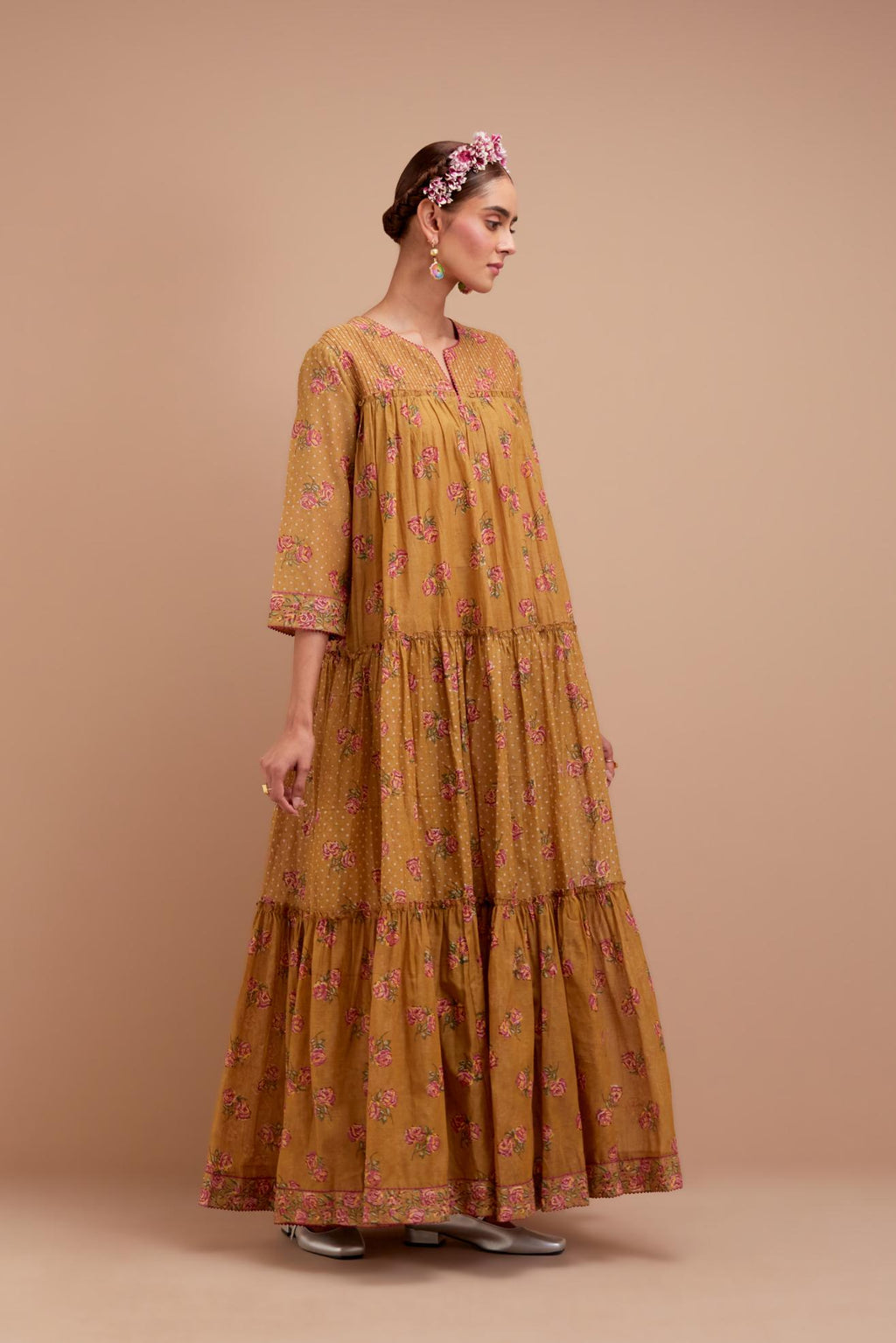 Olive Yellow three-tiered kurta set with quilted yoke and all-over Pink & Yellow floral hand block print.