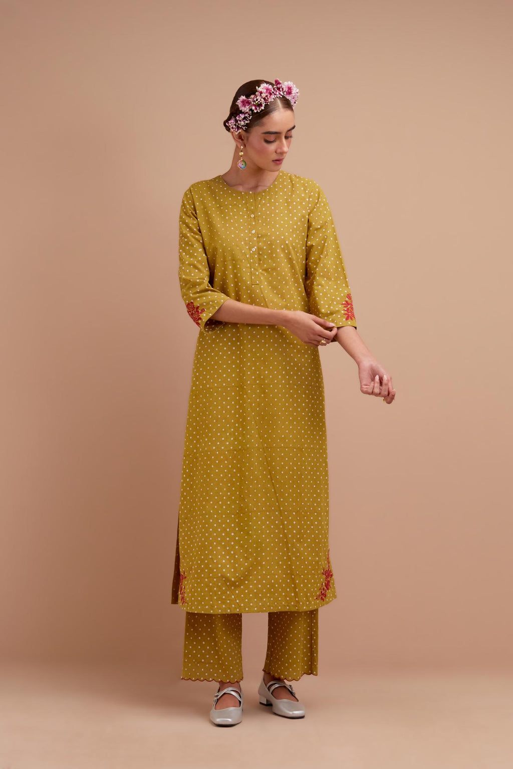 Olive Yellow Cotton straight long kurta set with all-over polka dot hand block print & embroidered floral bootas at the side hem.