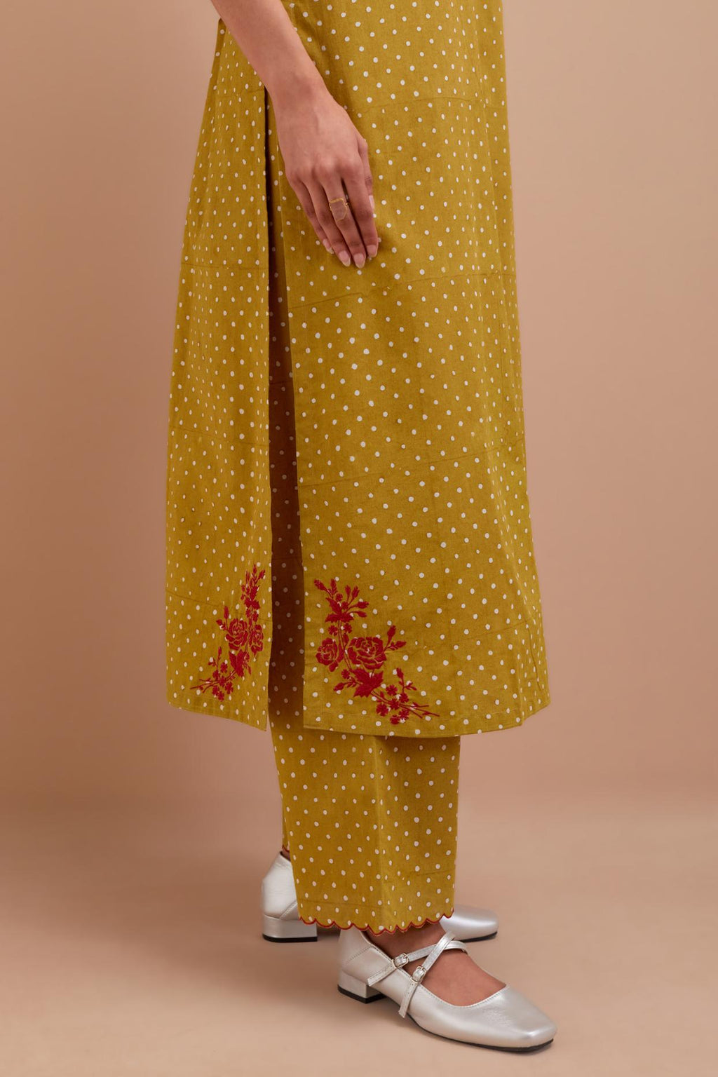 Olive Yellow Cotton straight long kurta set with all-over polka dot hand block print & embroidered floral bootas at the side hem.