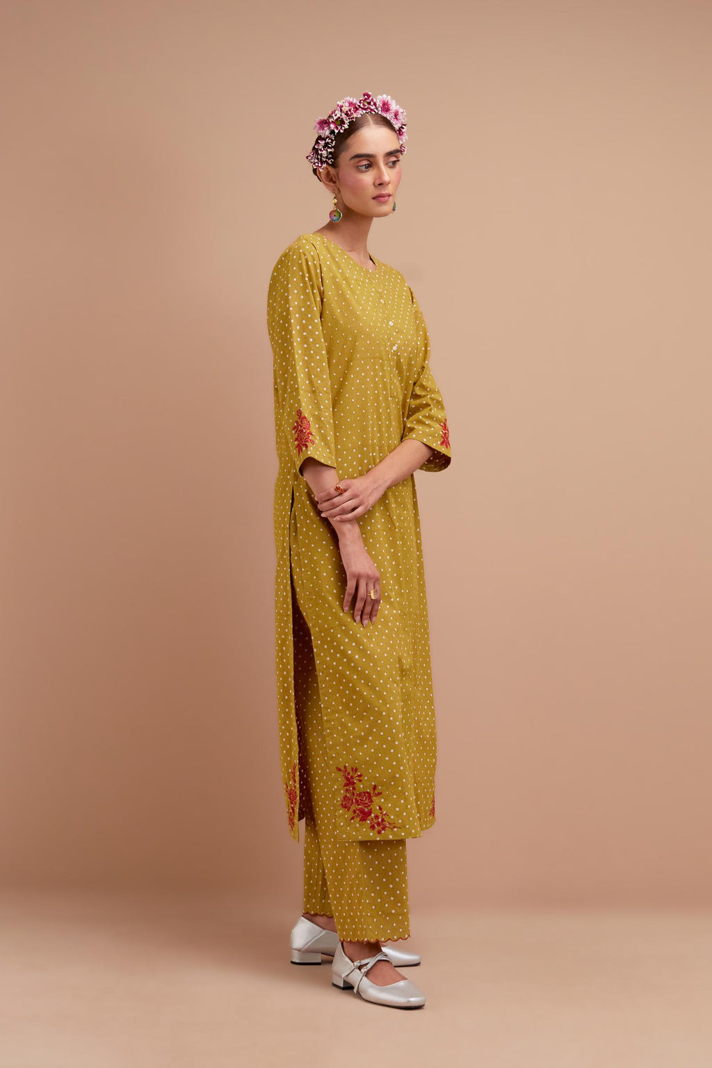 Olive Yellow Cotton straight long kurta set with all-over polka dot hand block print & embroidered floral bootas at the side hem.