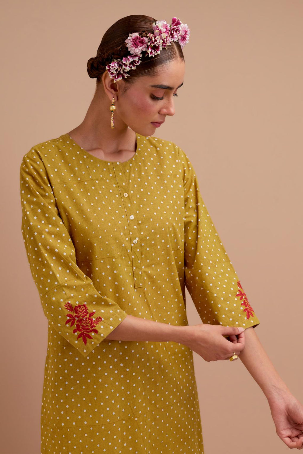 Olive Yellow Cotton straight long kurta set with all-over polka dot hand block print & embroidered floral bootas at the side hem.