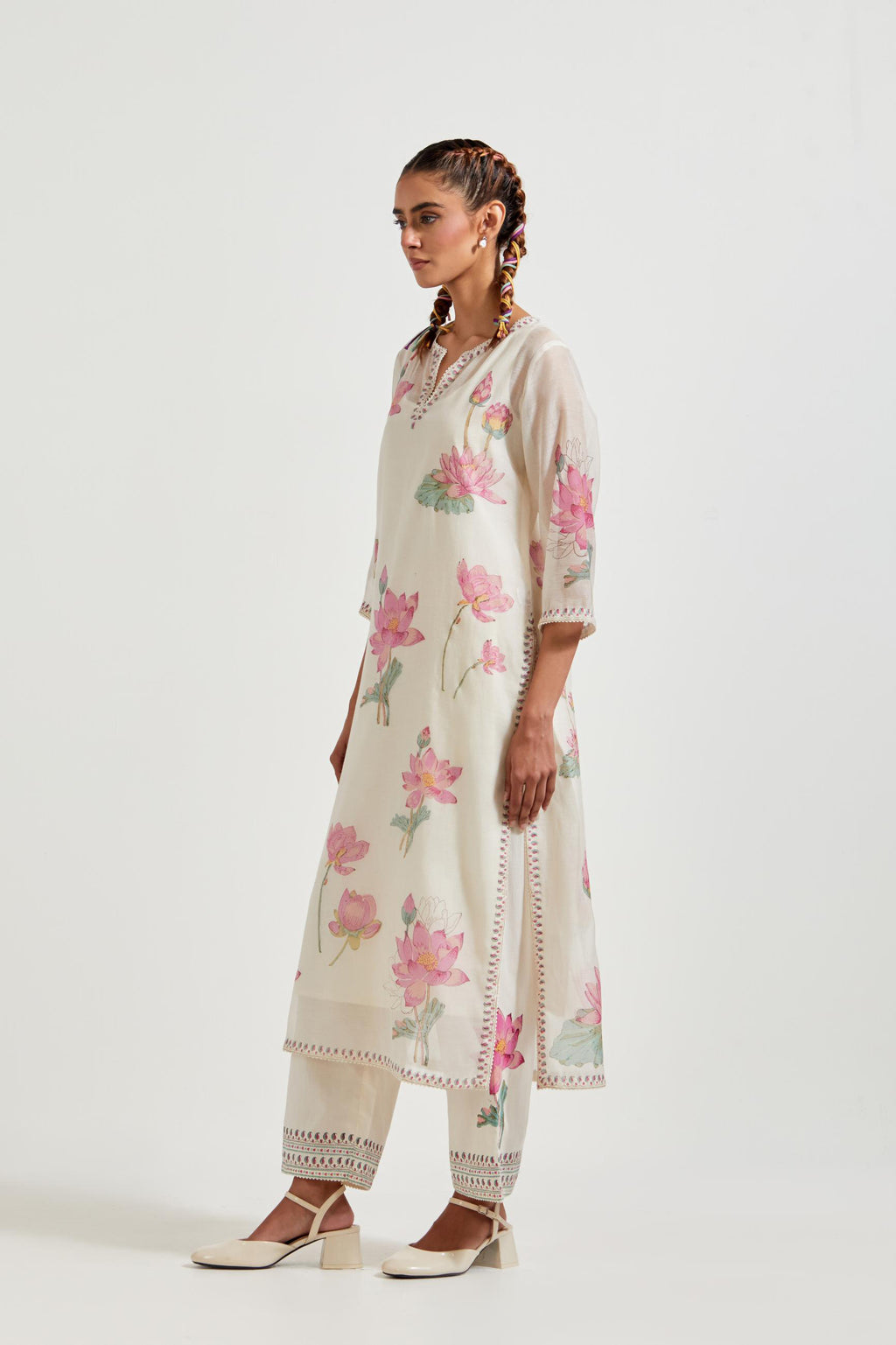 Off white cotton chanderi straight kurta set with all-over pink & green lotus flower hand block print.