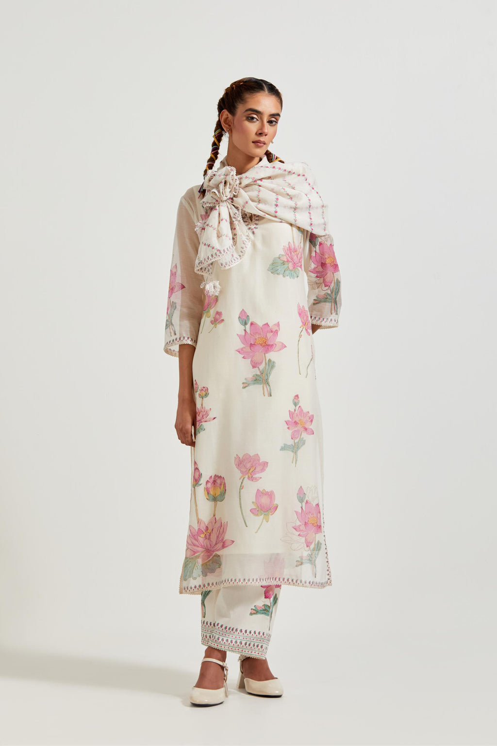 Off white cotton chanderi straight kurta set with all-over pink & green lotus flower hand block print.